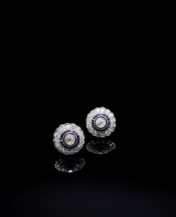 Lot 064 White gold earrings, with sapphires and diamonds