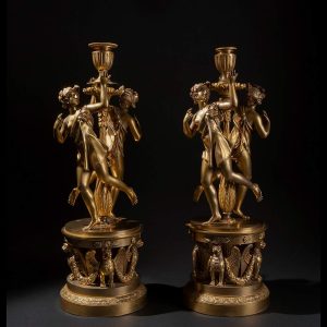 Lot 108 - Pierre - Philippe Thomire (Parigi 1751 - 1843), Pair of elegant gilded bronze candlesticks