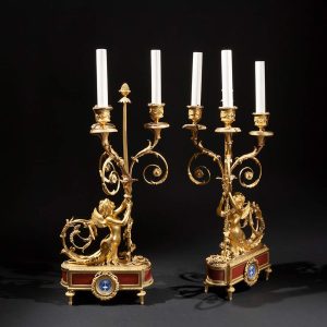 Lot 073 - Pair of gilded bronze candlesticks, England first half 19th century