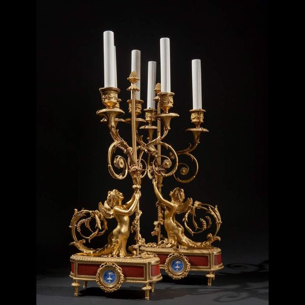 Lot 073 - Pair of gilded bronze candlesticks, England first half 19th century