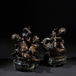 Lot 081 - Clodion (Nancy 1738 - Paris 1814), Pair of bronze statues of putti playing with swans