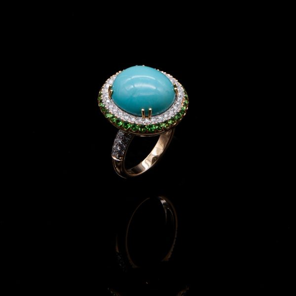 Lot 114 Ring made of yellow gold, turquoise, diamonds and garnets