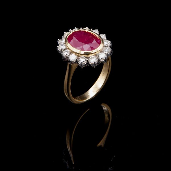 Lot 120 Yellow and white gold ring, with diamonds and large ruby