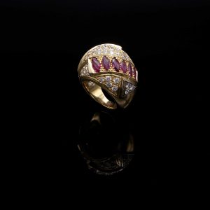 Lot 121 Yellow gold ring, with diamonds and rubies