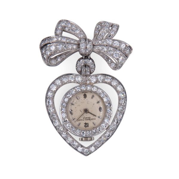 Lot 034 Bow brooch with heart pendant with white gold and diamond Audemars Piguet watch