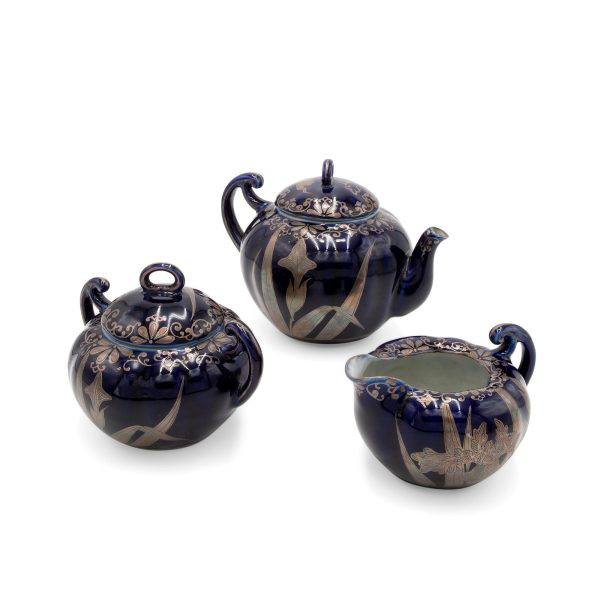 Lot 070 - Art Nouveau porcelain and silver tea set